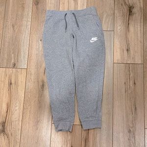 Nike grey sweatpants with embroidered white logo. Standard fit/medium. Girls